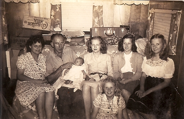 My Mom (kneeling on the floor) with her sisters, mother and step-dad.